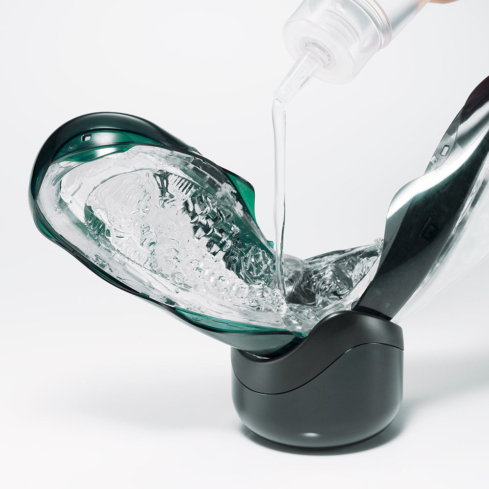 TENGA FLIP 360 Aurora Green on display stand - BDSM Authority