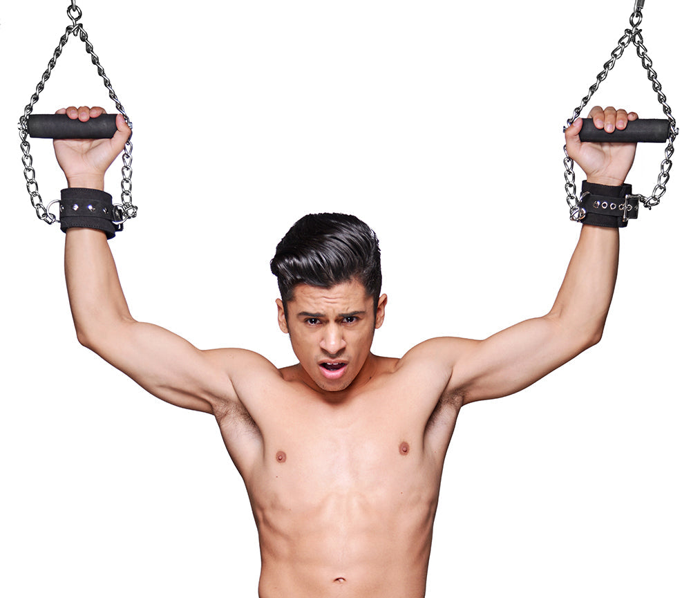 Strict Leather suspension cuffs shown in use - BDSM Authority