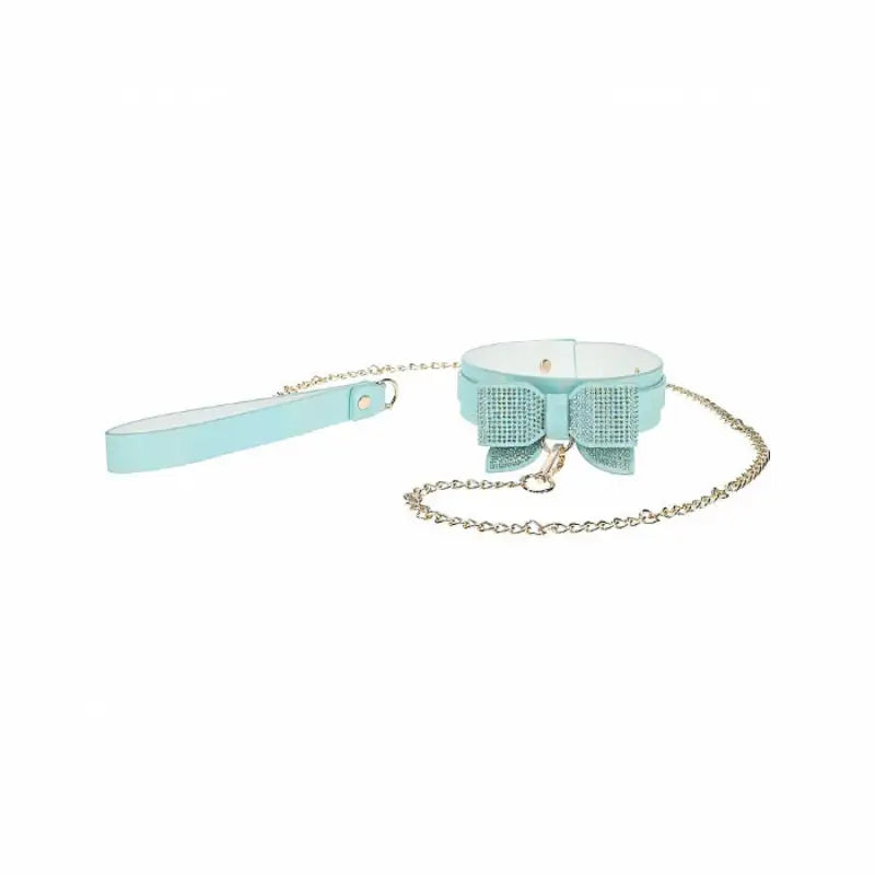 Ouch! International Paris Collection 8-Piece Bondage Kit with Iridescent Handbag, Collar and Leash, Cuffs, Flogger and Rechargeable Vibrating Bullet