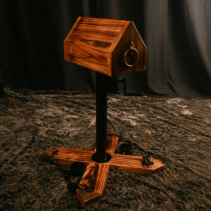 Spanish Rider Elm Wood Adjustable Pressure and Restraint System left view – elm wood BDSM restraint stand with central pole, adjustable shackles, and sturdy frame support design.
