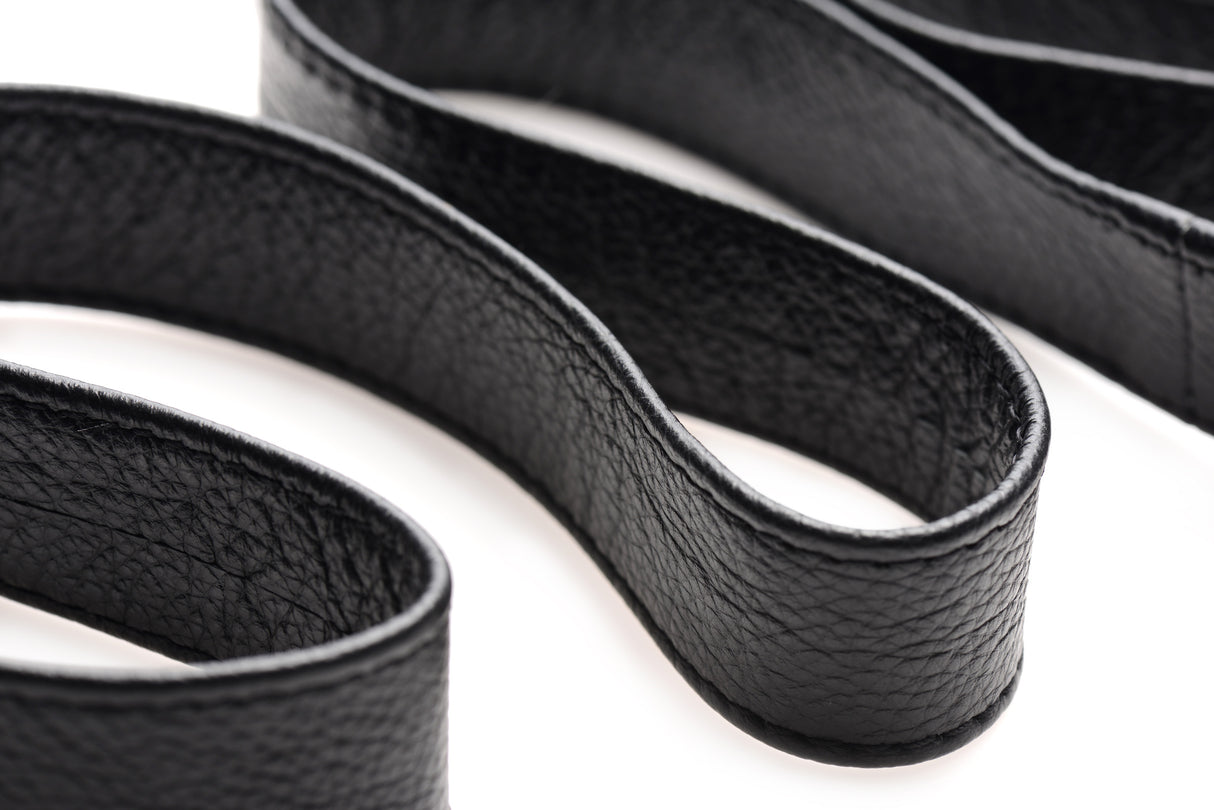 Adjustable leather strap and D-ring hardware of the bed restraint kit - BDSM Authority