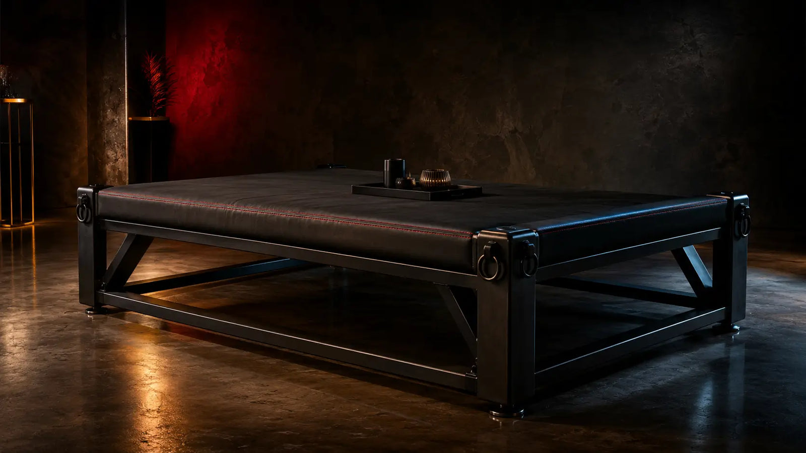 Elegant empty human-furniture platform as the centerpiece of a dark editorial playroom BDSMAuthority