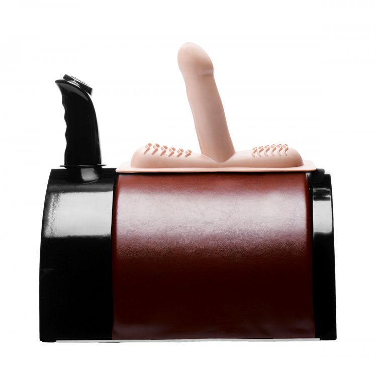 The The Saddle Deluxe Sex Machine from a side while the penetrating, dildo attachment is put on top of it. | Kinkly Shop