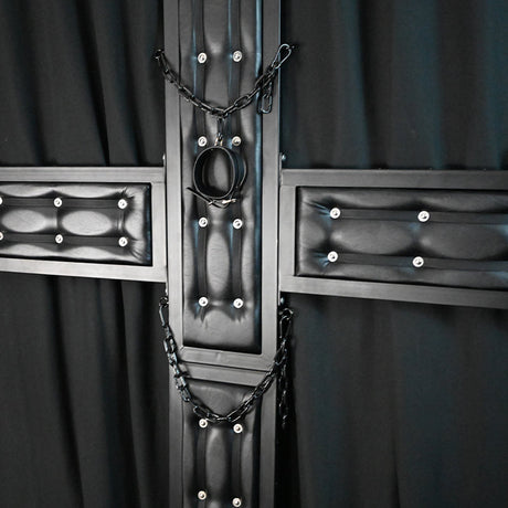 Wall-mounted St. Andrew's cross showing arm span and frame dimensions - BDSM Authority