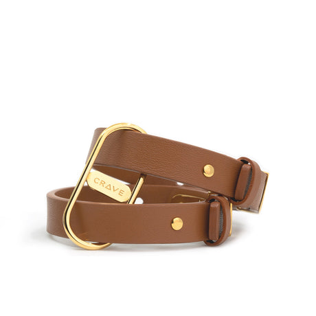 Crave ICON Cuffs leather bracelet restraints in tan and 24kt gold - BDSM Authority