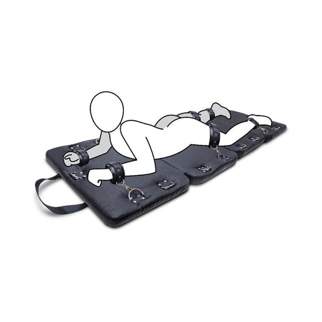 Diagram of the Me You Us bondage board with a person restrained lying down - BDSM Authority