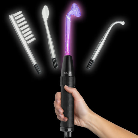 Zeus Twilight violet wand kit with all four glass electrodes laid out - BDSM Authority