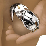 Illustration of the Entrapment locking chastity cage shown fitted on a male model - BDSM Authority