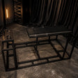 Adjustable kneeling and prone positioning frame with padded support and ergonomic restraint structure
