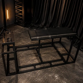 Adjustable kneeling and prone positioning frame with padded support and ergonomic restraint structure
