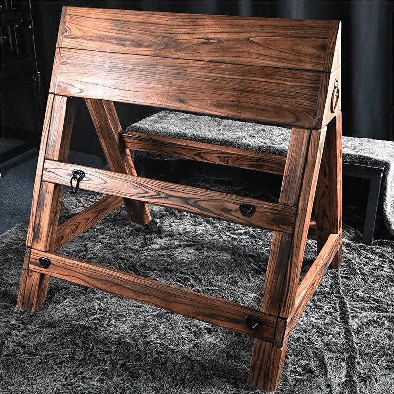 Adjustable kneeling and prone triangular wooden horse HQSM-018 side view featuring sturdy wooden construction, ergonomic angled support design, and adjustable positioning for therapy or training applications

