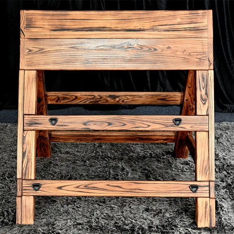 Adjustable kneeling and prone triangular wooden horse HQSM-018 zoomed front view highlighting durable wooden craftsmanship, ergonomic support padding, and adjustable positioning details for therapy or training use
