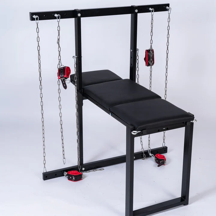 Exhibition bench for bondage, humiliation, and breeding fetish furniture with integrated restraints and shackles for secure positioning design
