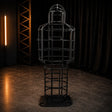 Heavy-duty human-shaped restraint cage with reinforced steel construction and ergonomic enclosed frame design
