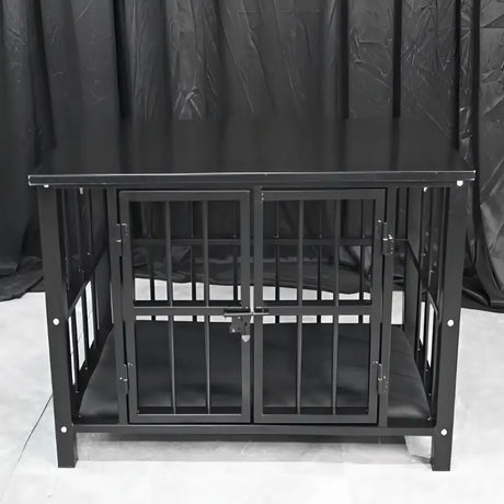 Heavy-duty table cage with reinforced steel frame and secure enclosed restraint structure

