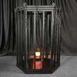 Heavy-duty hexagonal hanging cage HQJS-006 lifestyle scene featuring a durable industrial-style metal frame designed for decorative storage, display use, and modern interior or outdoor spaces.
