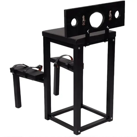 Kneeling stockade restraint bench with sturdy frame and secure positioning design for controlled posture and support
