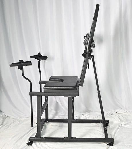 Leveled-Up Gynecology Chair Full-Control Positioning System left view, heavy-duty adjustable BDSM chair with padded support, reinforced frame, and multi-angle positioning for secure stability and control.
