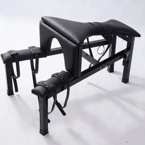 Multi-Position Punishment Goat for Controlled Positioning and Split-Leg Restraint, heavy-duty BDSM restraint furniture with reinforced frame and adjustable support points for secure positioning and stability.
