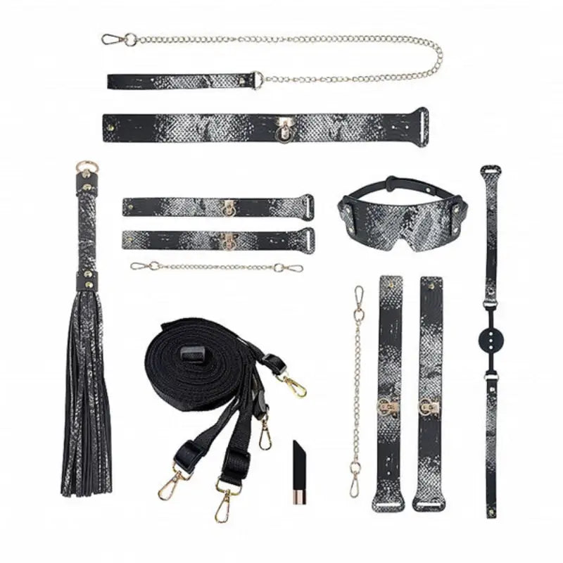 Ouch! International Florence Collection 8-Piece Bondage Kit with Iridescent Handbag, Collar, Cuffs, Flogger and Vibrating Bullet