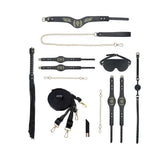 Ouch! International London Collection 8-Piece Bondage Kit with Iridescent Handbag, Collar, Cuffs, Flogger and Vibrating Bullet