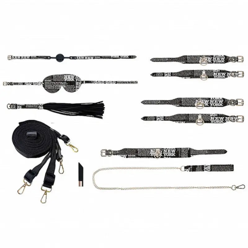 Ouch! International New York Collection 8-Piece Bondage Kit with Iridescent Handbag, Collar, Cuffs, Flogger and Vibrating Bullet