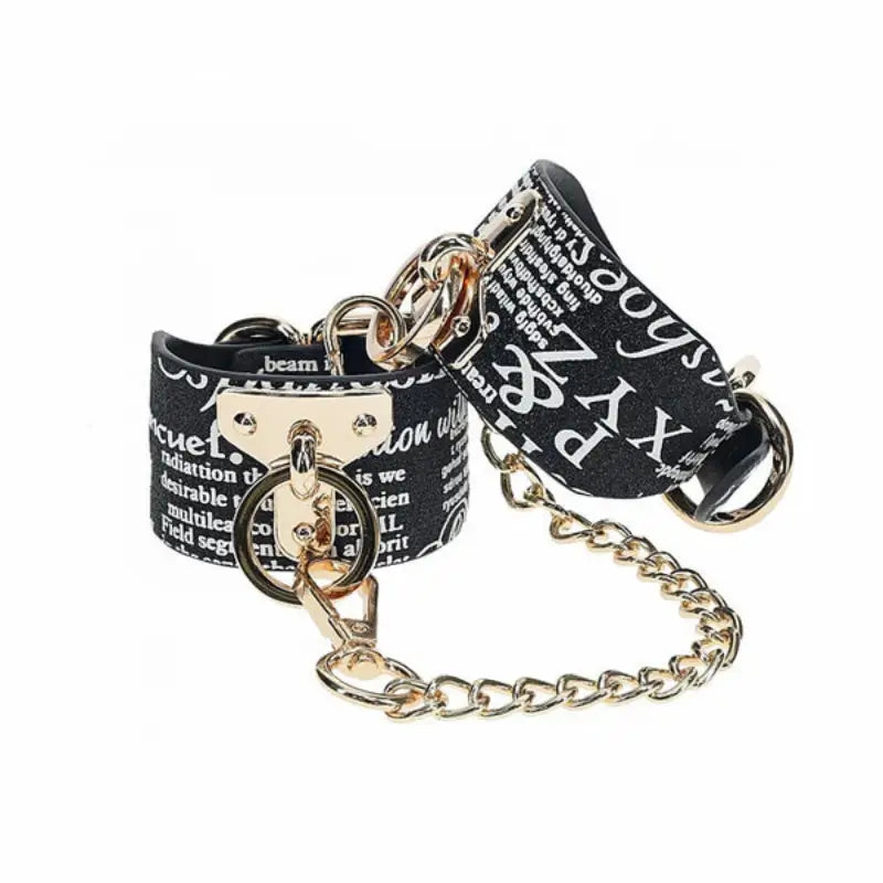 Ouch! International New York Collection 8-Piece Bondage Kit with Iridescent Handbag, Collar, Cuffs, Flogger and Vibrating Bullet