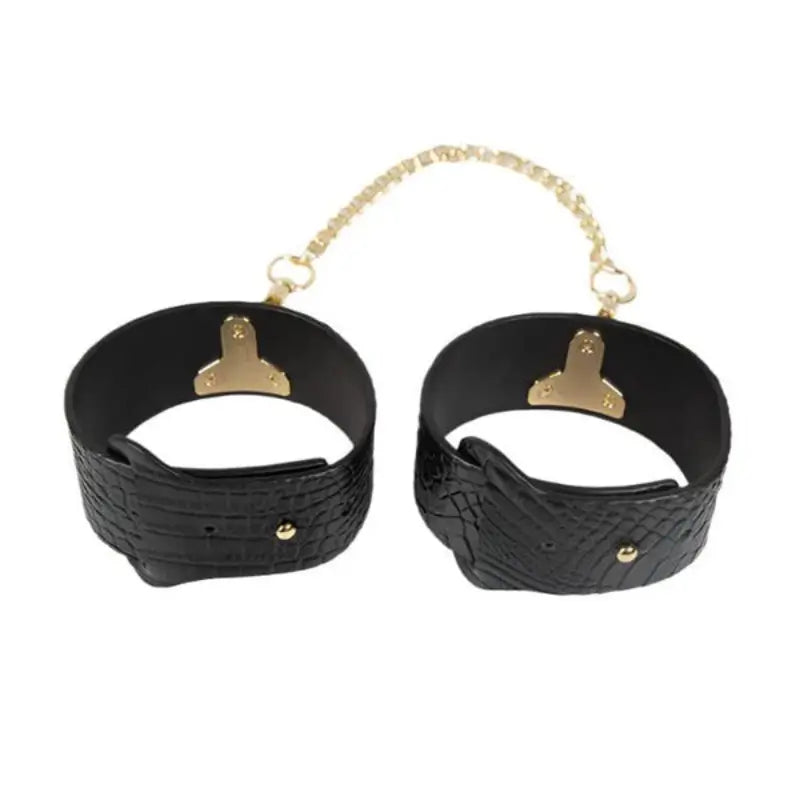 Ouch! International Rome Collection 8-Piece Bondage Kit with Iridescent Handbag, Collar, Cuffs, Flogger and Vibrating Bullet