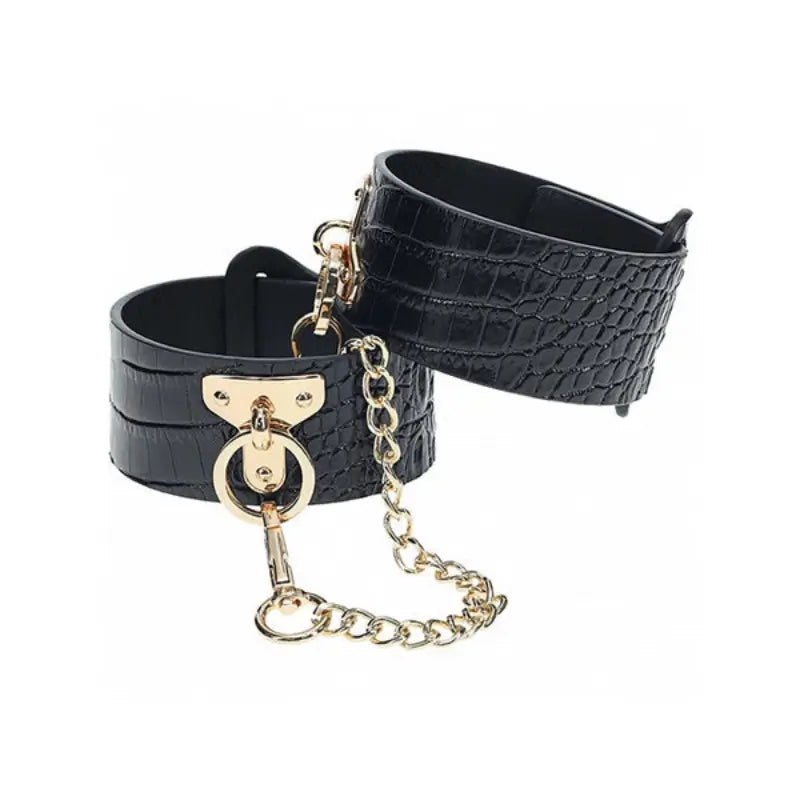Ouch! International Rome Collection 8-Piece Bondage Kit with Iridescent Handbag, Collar, Cuffs, Flogger and Vibrating Bullet