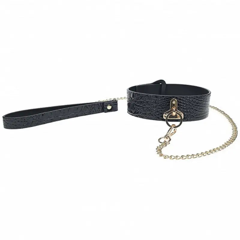 Ouch! International Rome Collection 8-Piece Bondage Kit with Iridescent Handbag, Collar, Cuffs, Flogger and Vibrating Bullet