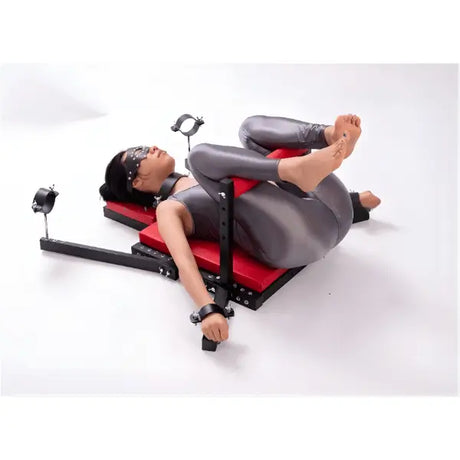 Portable restraint bench side view shown in use - BDSM Authority