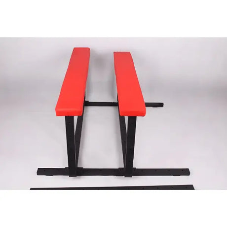 Red Cushion spanking bench front view with padded surface - BDSM Authority