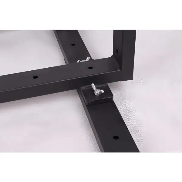Red cushion spanking bench with support stands and bolt hardware for secure frame assembly design
