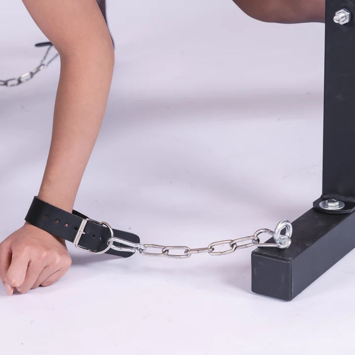 Red Trojan Horse Restraint Bench Adjustable BDSM Positioning System left hand view, heavy-duty padded BDSM bench with adjustable restraint points and reinforced frame for secure positioning and support.

