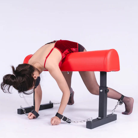 Red Trojan Horse bondage bench shown in use with a model - BDSM Authority