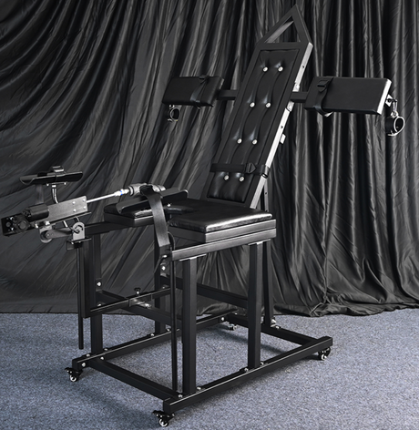 Gynecology chair shown with the optional quiet add-on sex machine and attachment configuration - BDSM Authority