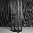 Sleeping and standing confinement cage system with durable steel frame and multi-position adjustable design for controlled restraint setup
