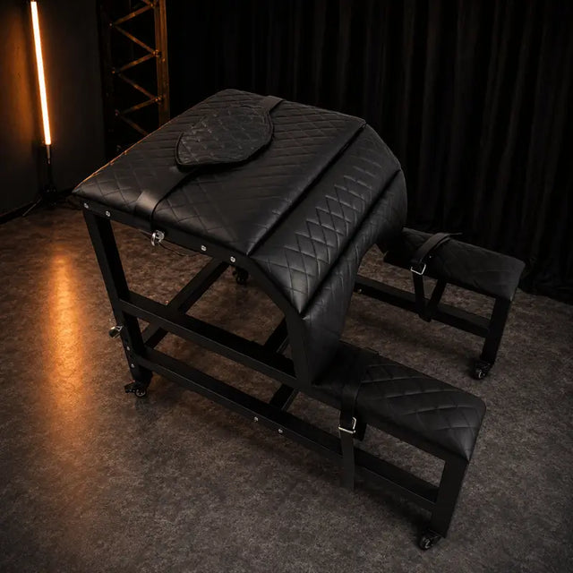 Studio-grade bondage bench N-GZ-003 with padded support surface and reinforced adjustable frame design
