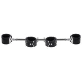 Adjustable swiveling spreader bar with four black leather cuffs on a silver aluminum bar - BDSM Authority