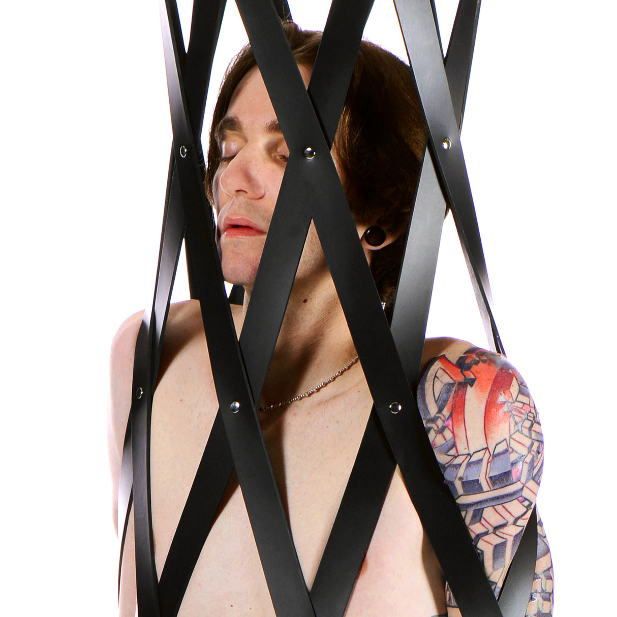 Rubber strap suspension cage upper body cradle detail - BDSM Authority