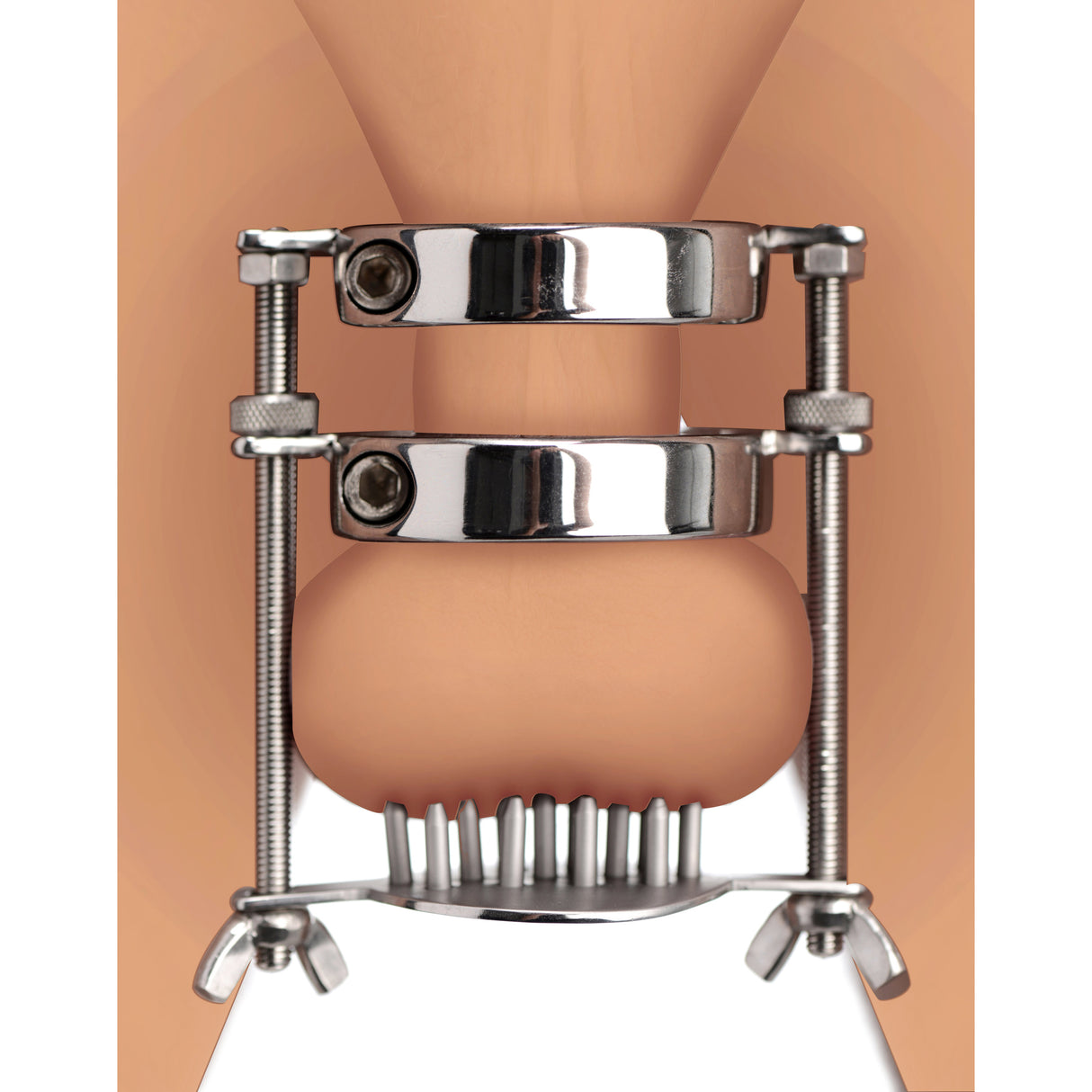 Spiked steel ball stretcher worn on the body, two rings stretching the scrotum with spike plate below - BDSM Authority