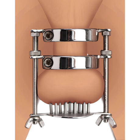 Spiked steel ball stretcher worn on the body, two rings stretching the scrotum with spike plate below - BDSM Authority
