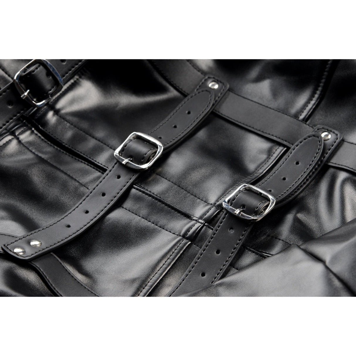STRICT straight jacket buckle and strap detail - BDSM Authority