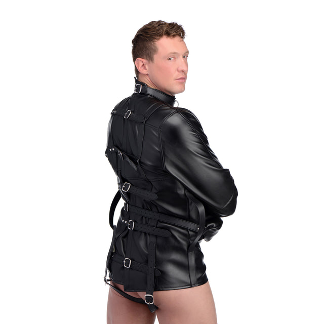 STRICT black leather-look straight jacket fastened up the back on a model - BDSM Authority