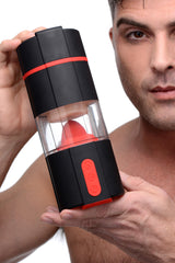 Flicking Tongue masturbator shown in hand for scale - BDSM Authority