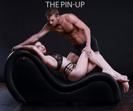 Sex chaise lounge black detail of curved seat and love pillow - BDSM Authority