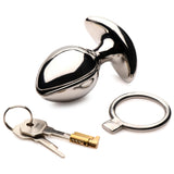 Closed steel plug shown with the flat circular expander key and gold locking pin - BDSM Authority