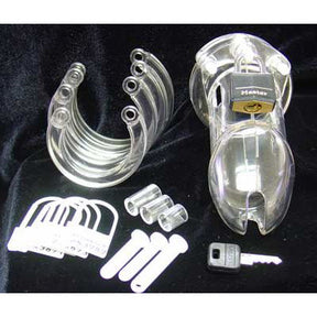 Clear CB-6000S male chastity cage kit with five sizing rings, spacers, locking pins, numbered plastic locks and brass padlock with key - BDSM Authority