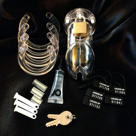 Clear polycarbonate CB-6000 male chastity cage with sizing rings and locks - BDSM Authority