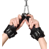 Strict Leather fleece lined leather suspension cuffs worn on the wrists - BDSM Authority